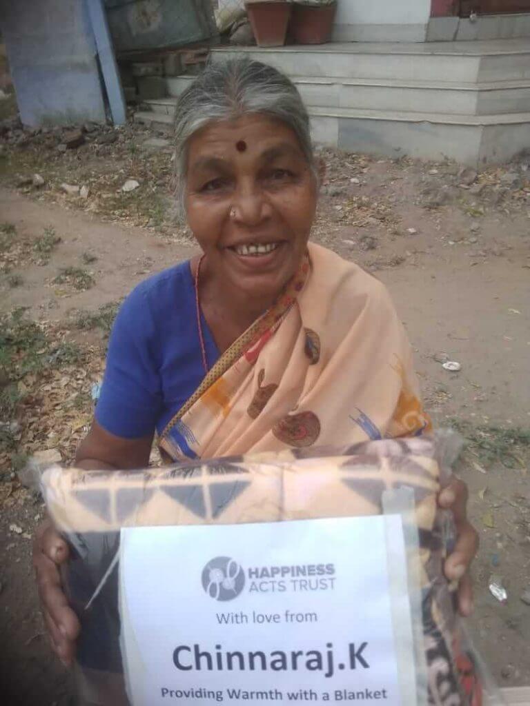 Happiness acts blanket donation