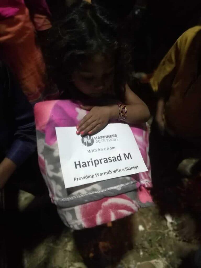 Happiness acts blanket donation
